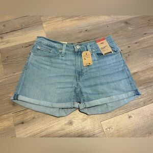 Levi’s mid length mid rise shorts size 27 new with tags